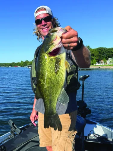 Lifting largemouth from summer docks